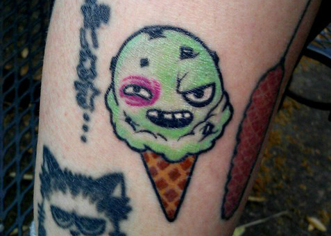 Small Beat Up Ice Cream Dude Tattoo