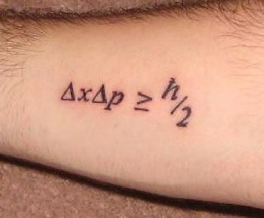 Small Black Ink Math Equation Tattoo On Forearm