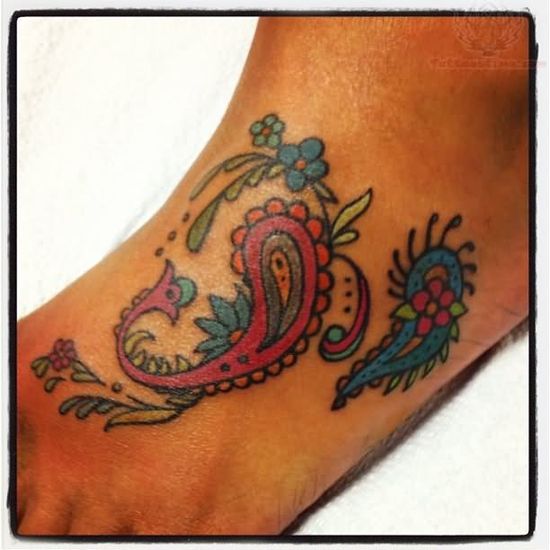 Small Colorful Flowers With Paisley Pattern Tattoo On Foot