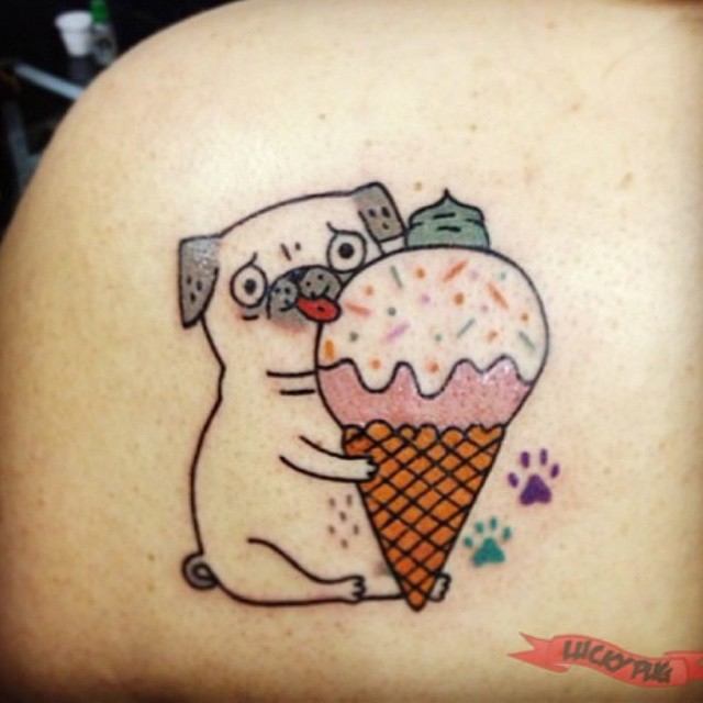 Small Dog Leaking Ice Cream Tattoo On Back Shoulder