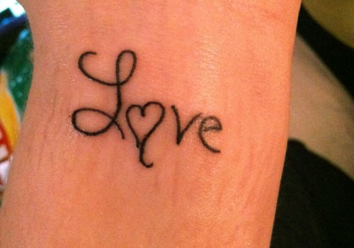 Small Love Word Tattoo On Wrist