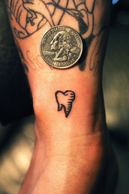 Small Molar Tooth Tattoo On Ankle