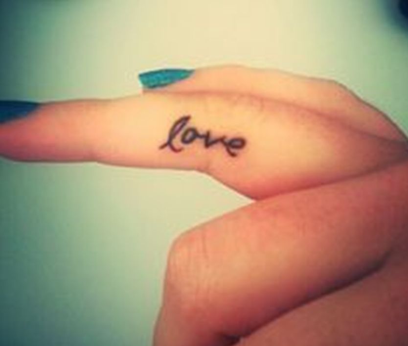 Smallest Love Tattoo On Finger