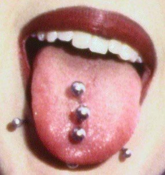 Snake Bites And Oral Tongue Piercing With Silver Studs