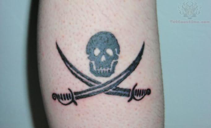 Tiny Black Jolly Roger Tattoo