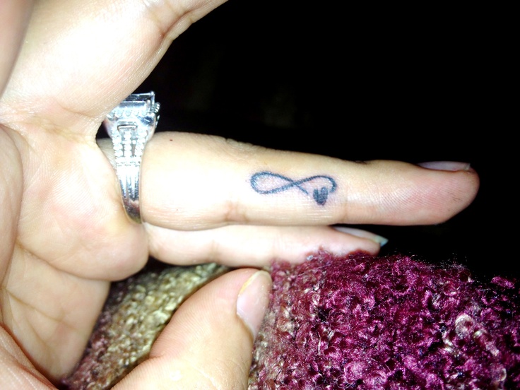 Tiny Infinity Love Tattoo On Finger