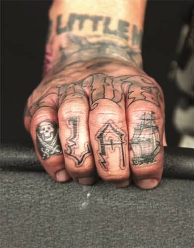 Tiny Jolly Roger And Pirate Ship With LA Tattoos On Fingers