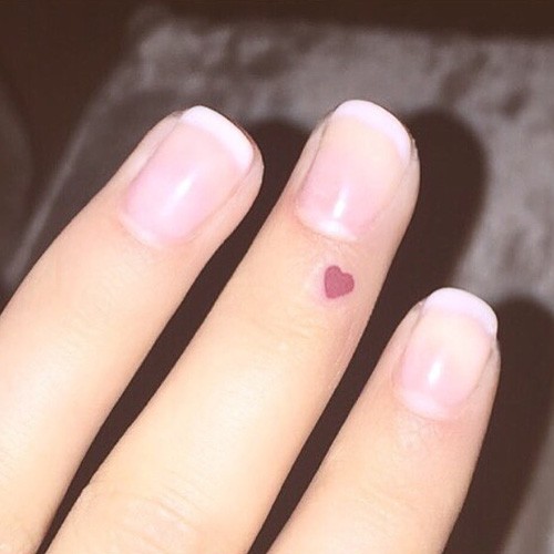 Tiny Love Heart Tattoo On Finger