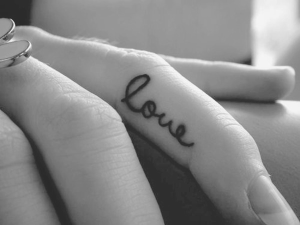 Tiny Love Tattoo On Finger