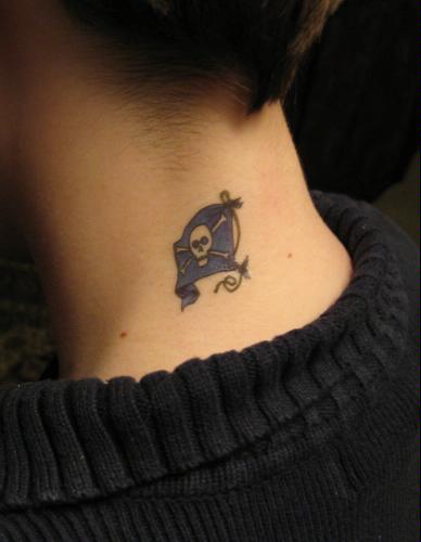 Tiny Purple Jolly Roger Flag Tattoo On Nape