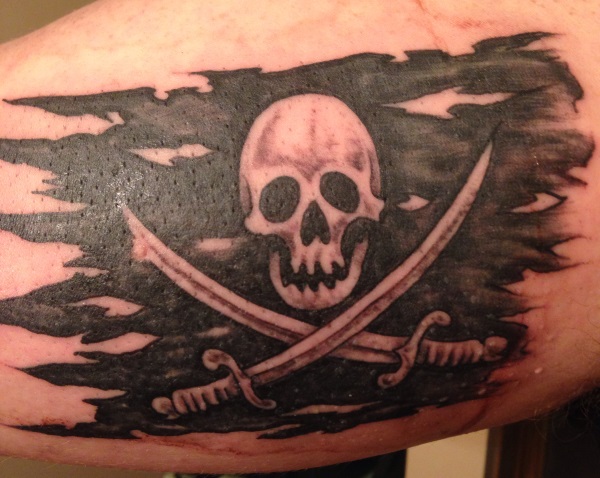 Torn Jolly Roger Flag Tattoo