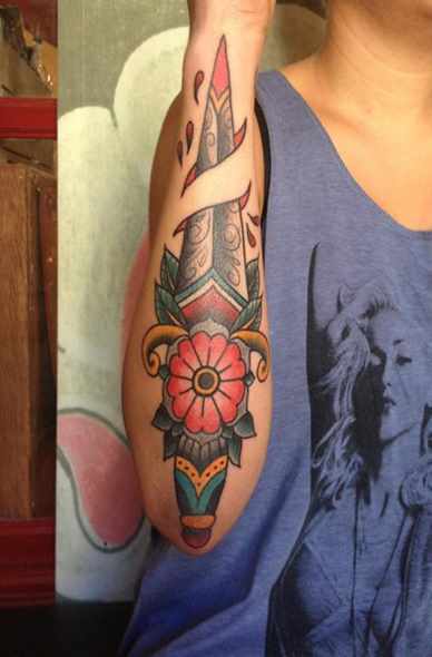 Traditional Dagger Ripped Skin Tattoo On Arm Sleeve For Girls