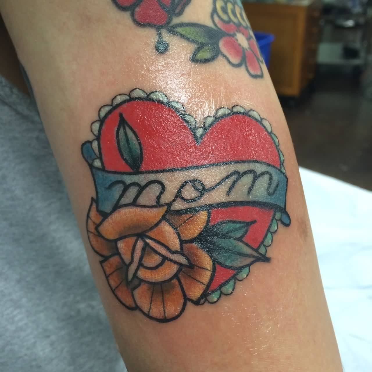 Traditional Mom Banner With Heart Tattoo On Arm By Chelsea Jane