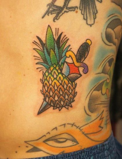 Traditional Small Dagger Ripped Pineapple Tattoo