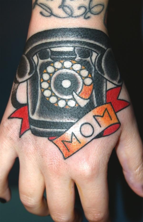 Traditional Telephone With Mom Banner Tattoo On Hand