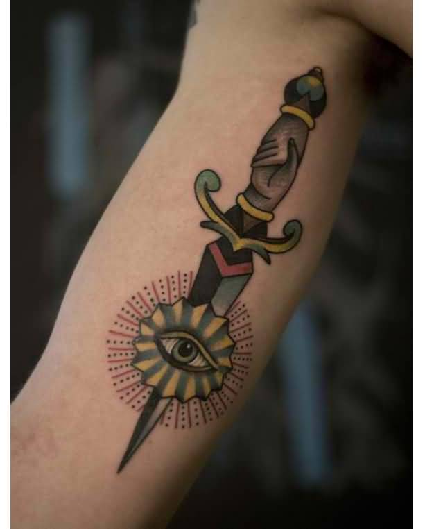 Unique Dagger And Eye Tattoo On Arm