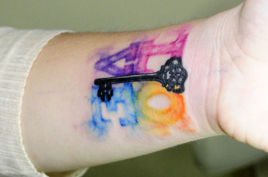 Watercolor Love Key Tattoo On Wrist