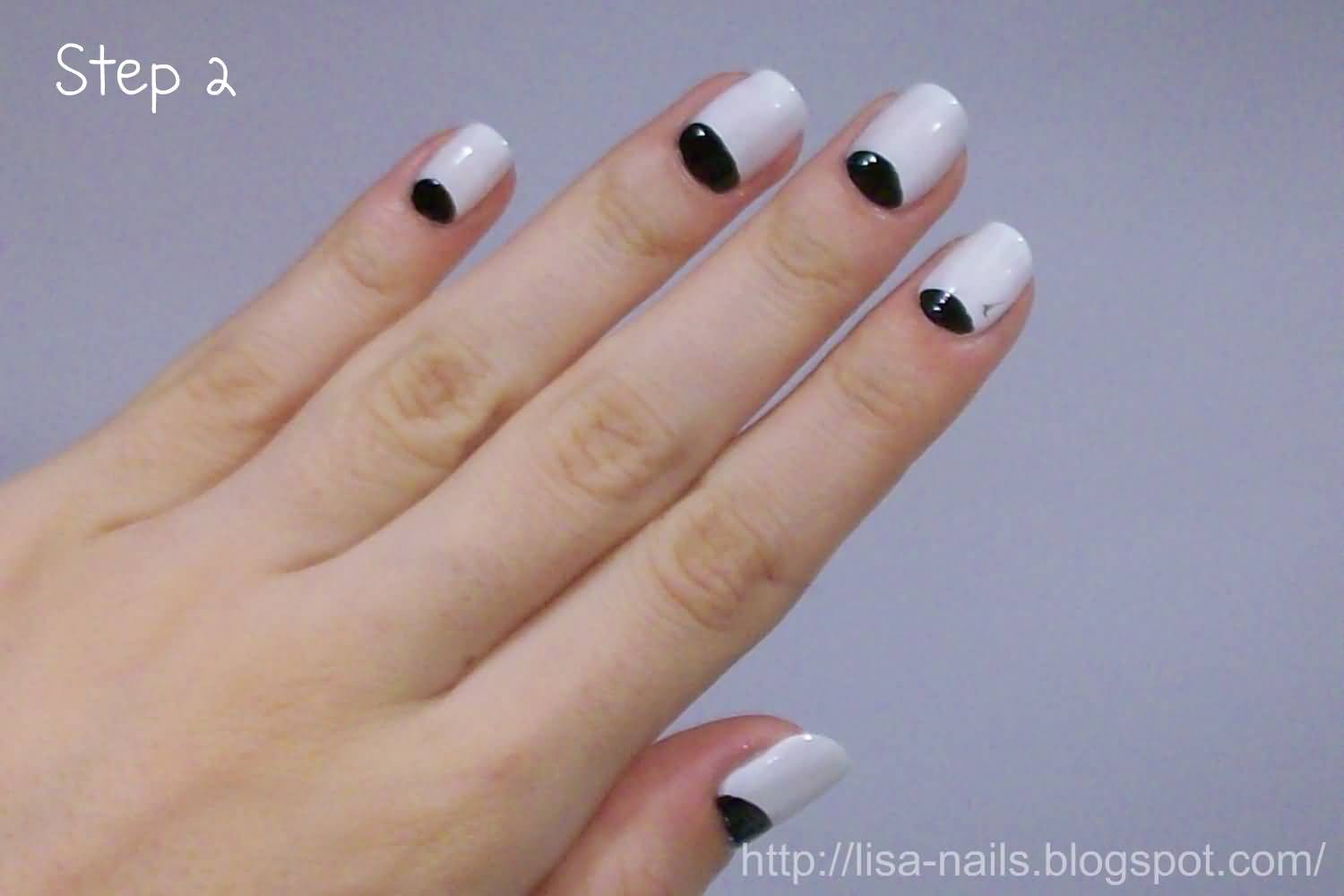 White Nails With Black Half Moon Nail Art