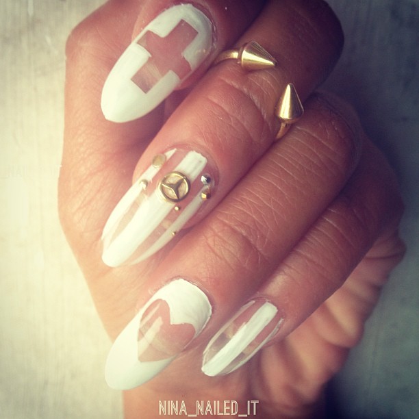 White Negative Space Nail Art With Gold Mercedes Benz Logo Design