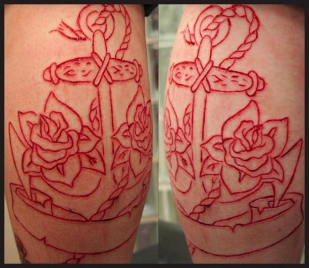 Anchor With Flowers Scarification Tattoo On Thigh