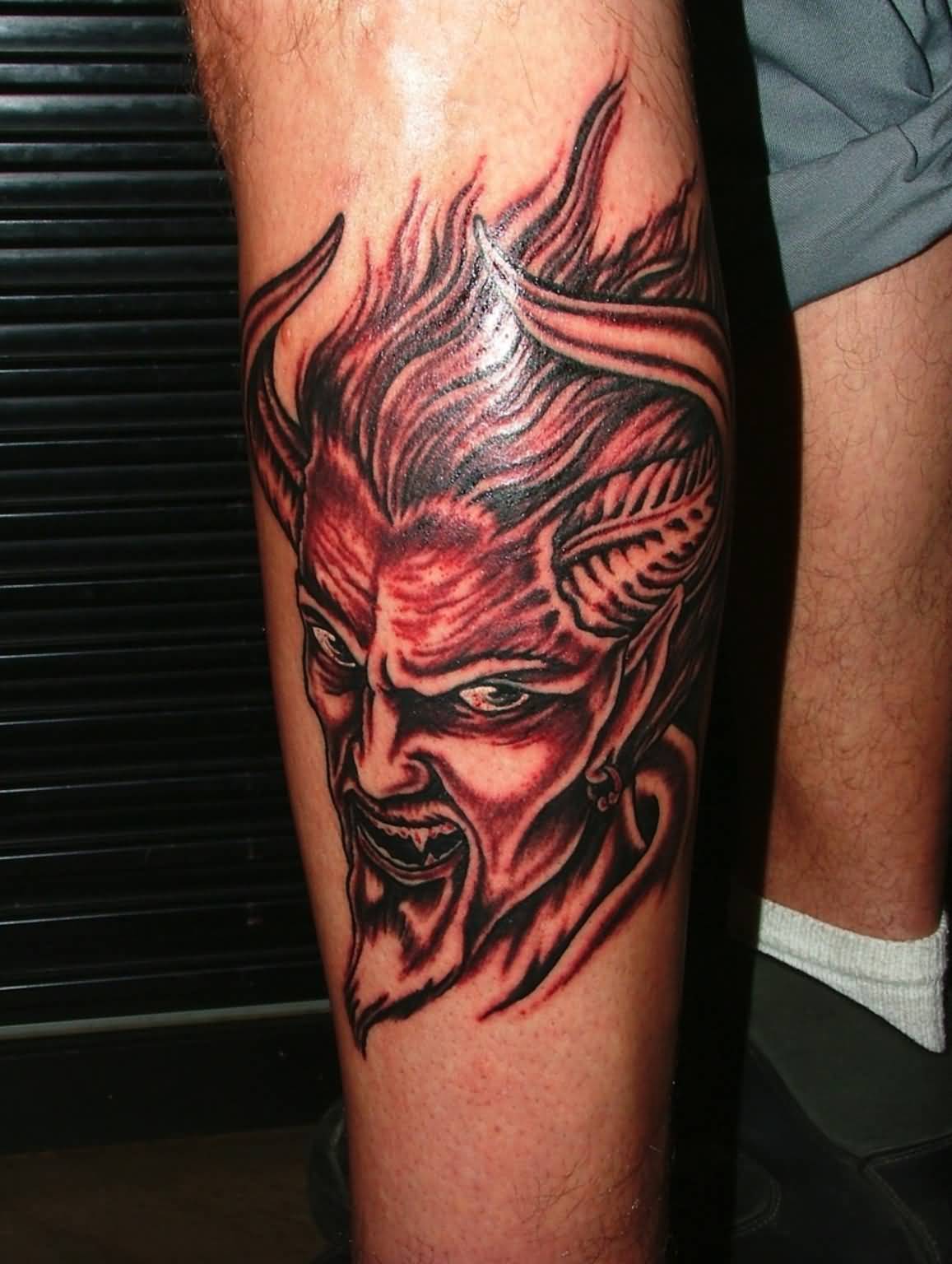 Angry Red Satan Tattoo On Leg