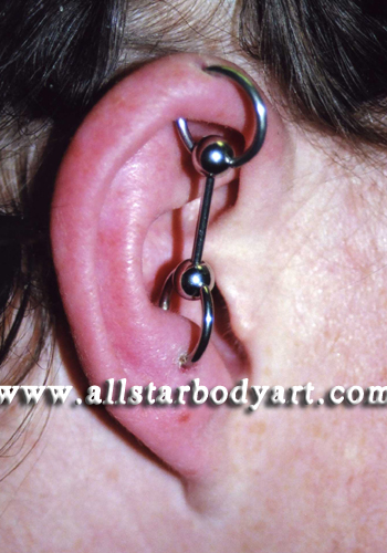 Anti Tragus And Ear Project Piercing On Girl Right Ear
