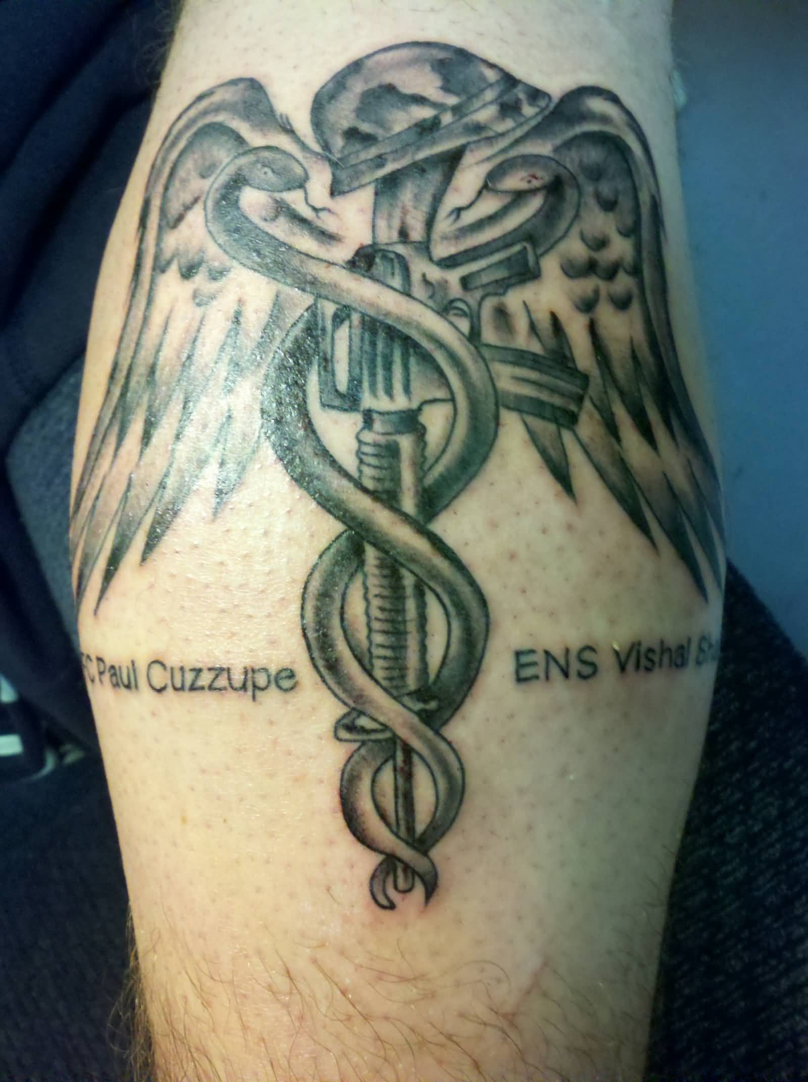 Army Weapons Medical Sign Style Tattoo On Arms