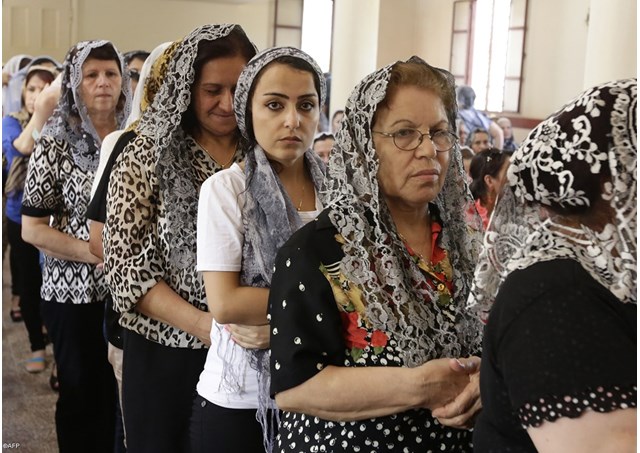 Assyrian Christians From Iraq, Syria And Lebanon Attend A Mass To Celebrate The Feast Of Assumption Of Mary