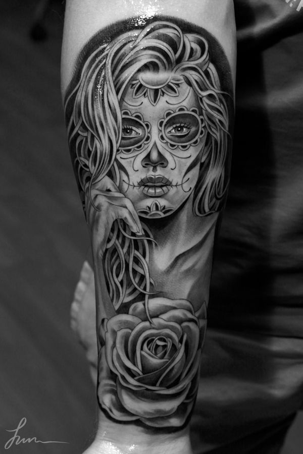 Awesome Catrina With Rose Tattoo On Forearm