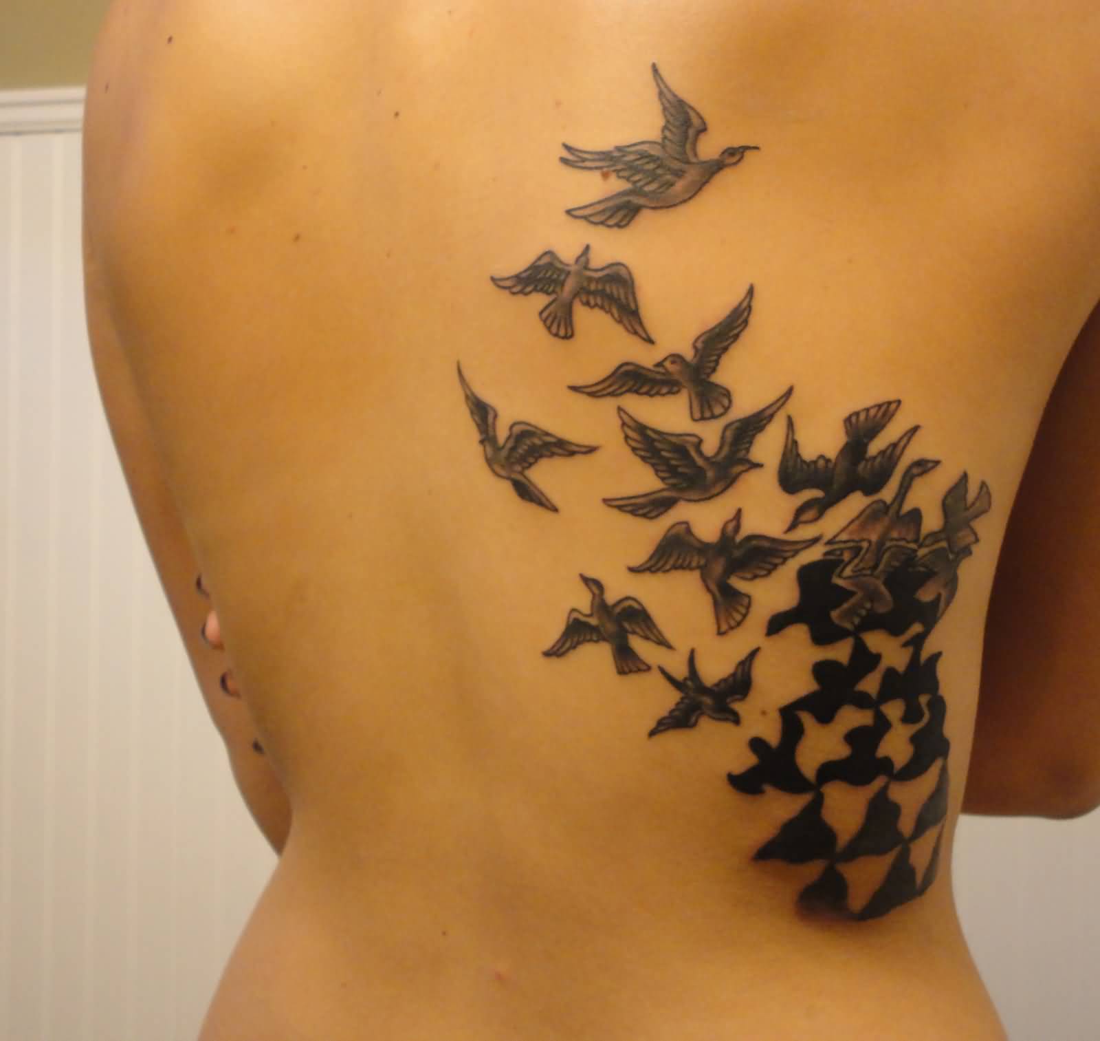 Awesome Escher Birds Tattoo On Back