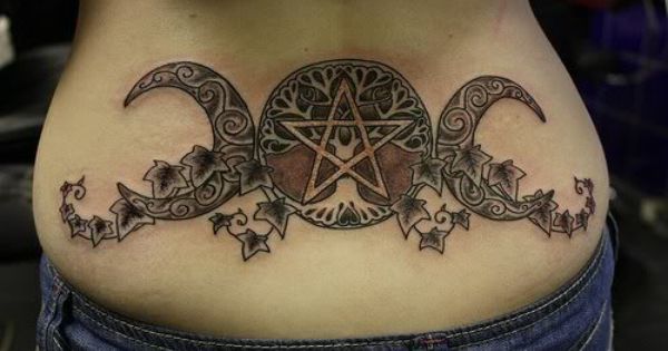 Awesome Pagan Moon Tattoo On Lower Back