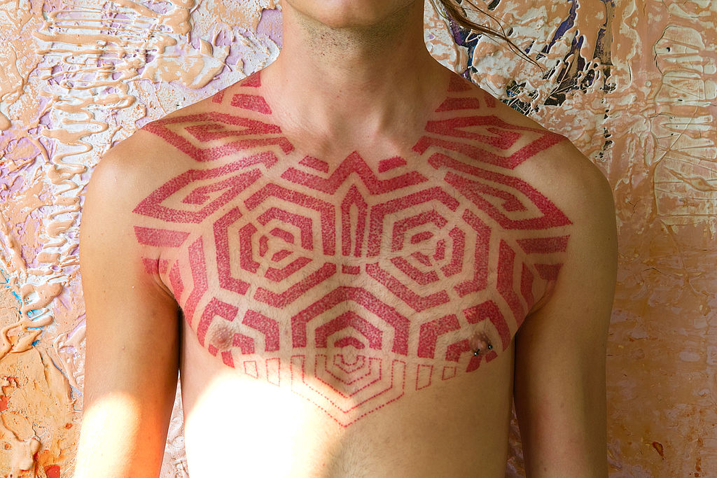 Awesome Scarification Tattoo On Chest For Men