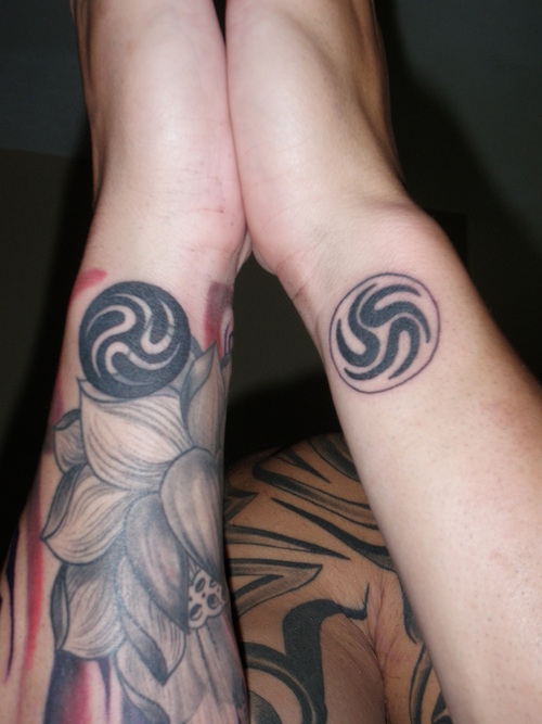Awesome Tibetan Symbols Tattoo On Both Wrists
