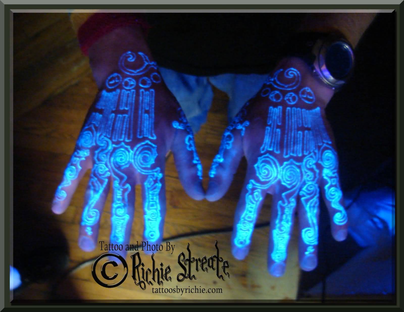 Awesome UV Tribal Tattoos On Both Hands