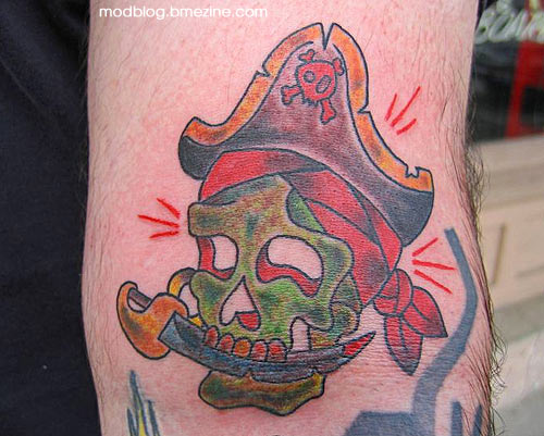 Awful Green Pirate Skull Traditional Tattoo