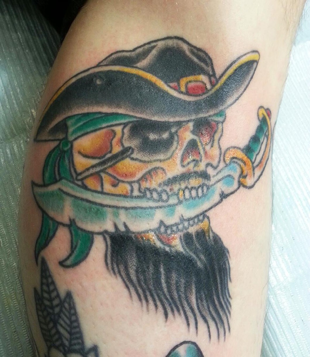 Awful Pirate Skull Having Beard Traditional Tattoo
