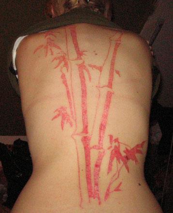Bamboo Scarification Tattoo On Upper Back
