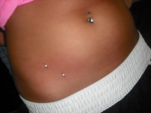 Beautiful Belly Piercing And Hip Dermal Anchor Piercing