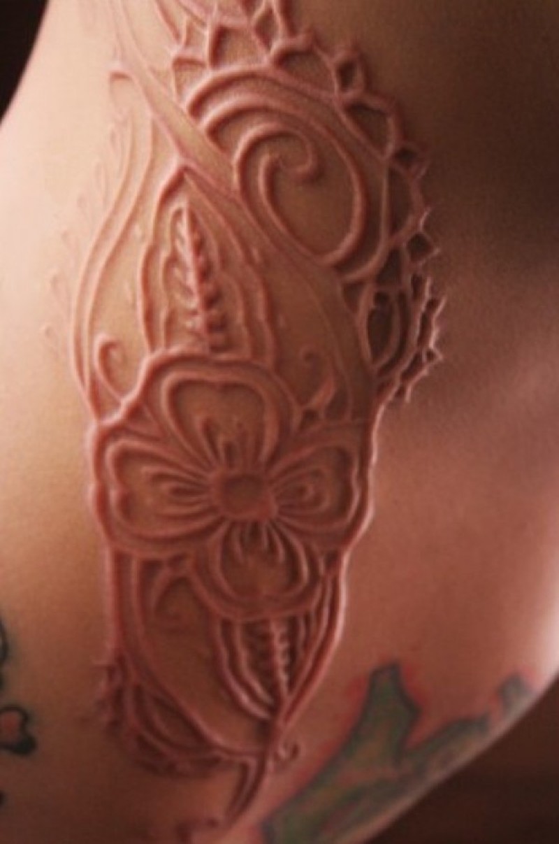 Beautiful Flower Skin Scarification Tattoo