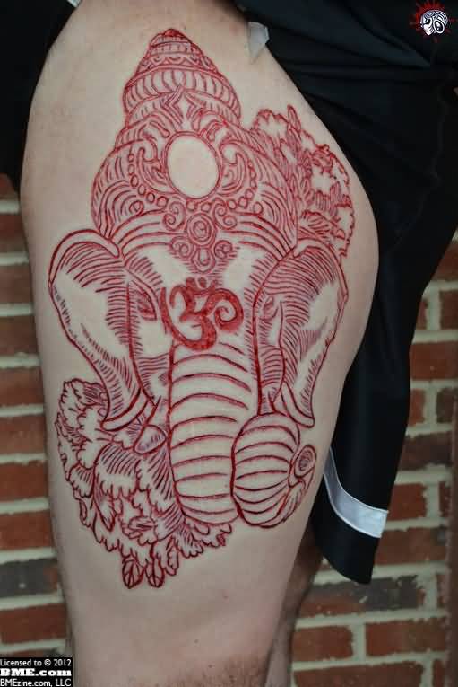 Beautiful Ganesha Scarification Tattoo On Thigh