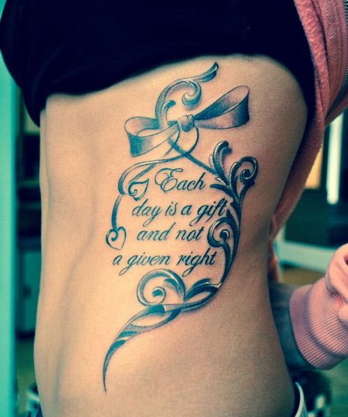 Beautiful Strength Quote Tattoo On Side Rib For Girls