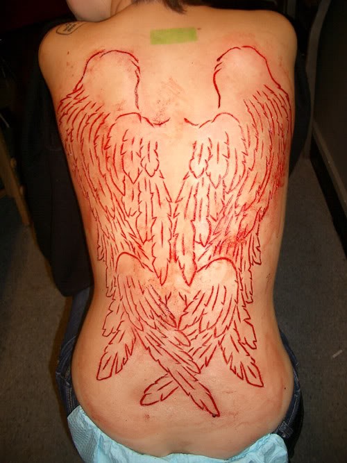 Big Skin Scarification Wings Tattoo On Full Back For Girls