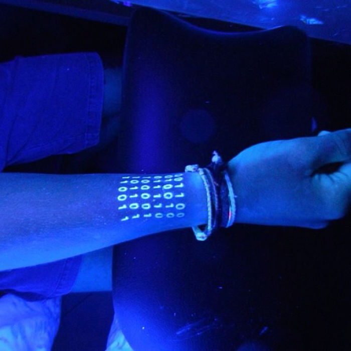 Binary Numbers UV Tattoo On Wrist
