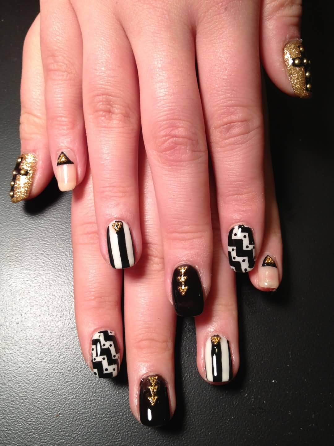 Black And White Geometric Nail Art Design With Studs