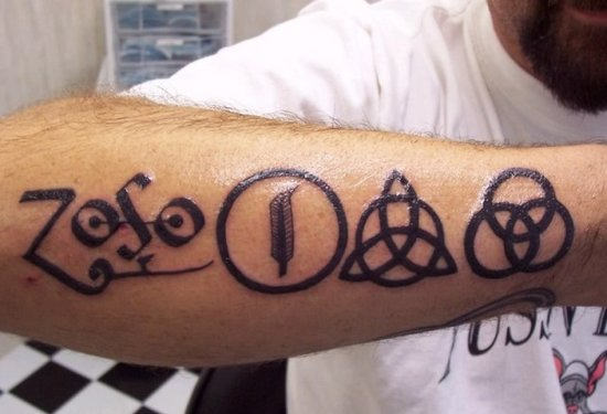 Black Pagan Symbols Tattoo On Arm Sleeve