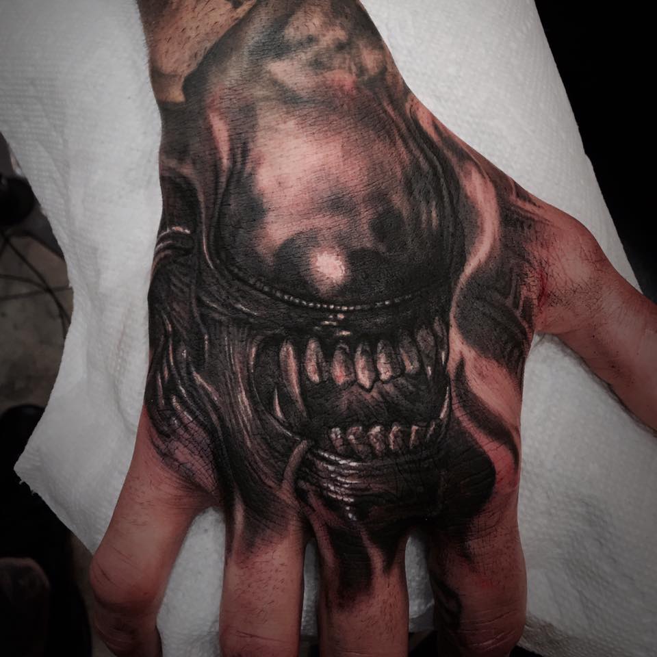 Black and Grey Giger Alien Tattoo On Right Hand by Carl Grace