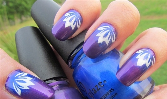 Blue And Purple With White Floral Design Nail Art