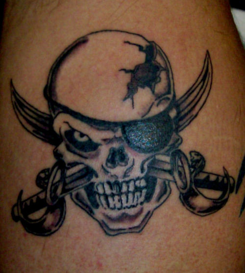 Broken Pirate Skull With Swords Tattoo