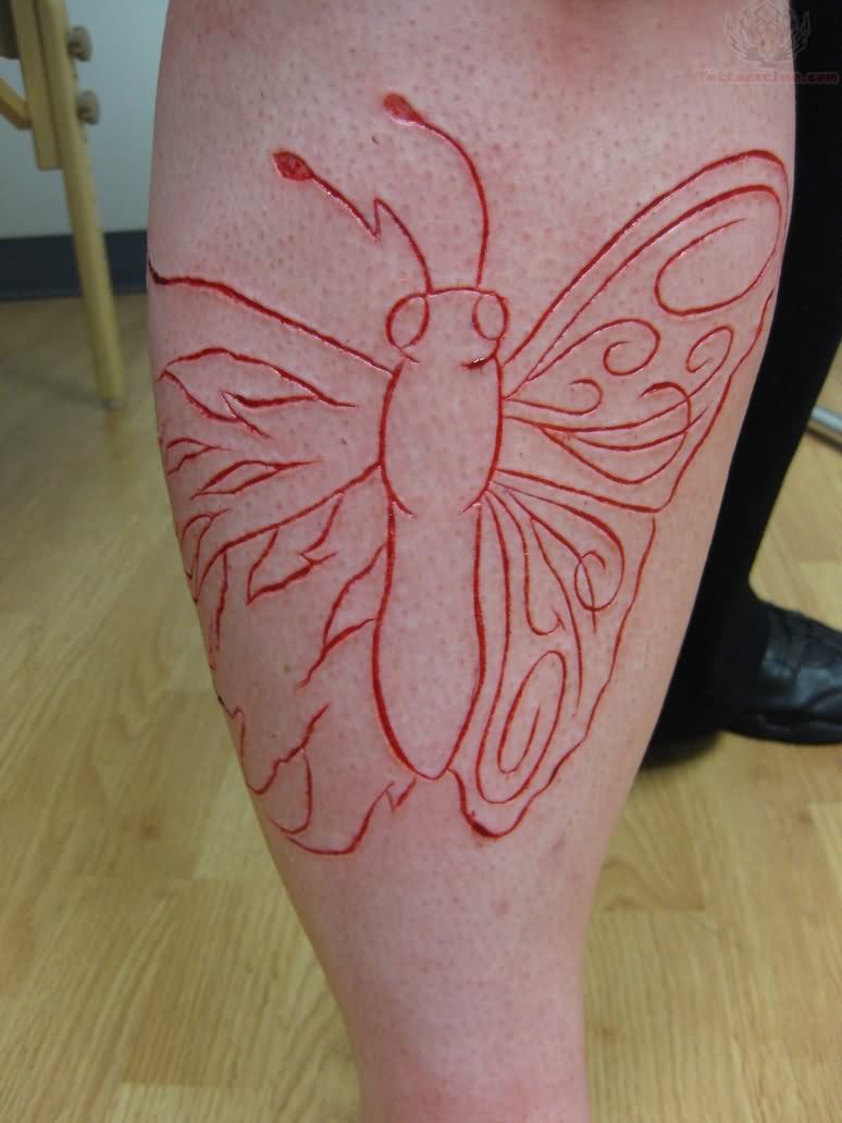 Butterfly Scarification Tattoo On Leg