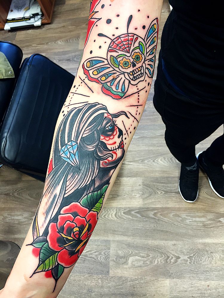 Catrina With Skull Butterfly Traditional Tattoo On Forearm